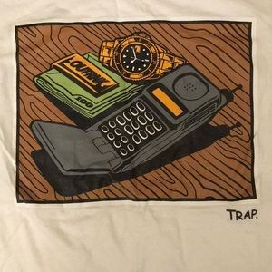 A white t shirt with money and watch and phone